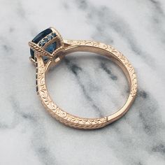 Meticulously handcrafted and forged in designer detail, it is an avant-garde styled ring for women of all ages. Follow our etsy shop become our members can get new tips on products on time and also get 10% off on new products. https://www.etsy.com/shop/AlphaJewelryCompany Gold Wedding Rings Vintage, Gold Ring Vintage, Dainty Engagement Rings, Blue Topaz Gemstone, Topaz Jewelry, London Blue Topaz Ring, Jewelry Blue, Platinum Engagement Rings, Ring Blue