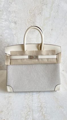 Hermès Birkin 25 Toile H Swift/Ecru Amande/Nata With Silver Hardware - AG Concierge Fzco Hermes Birkin 25, Birkin 25, The Bag, Hermes Birkin, Silver Hardware, Full Set, Swift, Zelda, Silver