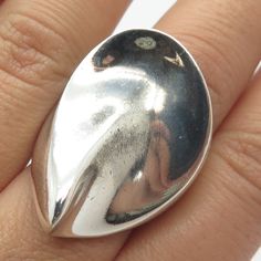 Great vintage condition.  925 Sterling Silver Vintage Concave Modernist Ring Size 7.5  Weight: 20.9g   WELCOME TO PAWN SHOP We are an actual pawn shop and have been in business for over 25 years. Since 1990, our establishment has been serving a variety of clients by providing them with short term cash solutions and options of liquidity regarding their treasured heirlooms. Acknowledging that today′s customers are very sophisticated and are looking for a variety of investments, our acquisitions ar Untreated Teardrop Silver Ring, Modernist Ring, Vintage Italy, Peridot Gemstone, Pawn Shop, Size 10 Rings, Rolo Chain, 25 Years, Beautiful Rings