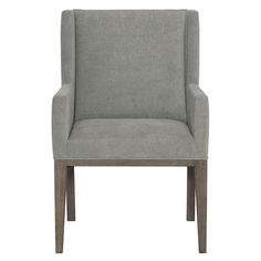 an upholstered grey chair with wooden legs and arms, viewed from the front