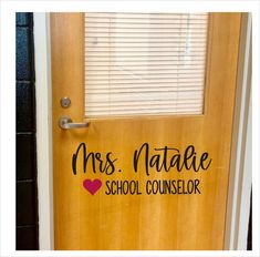 a door with the words mrs matae school counselor painted on it's side