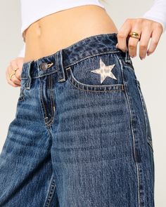 Ultra-comfortable jeans in a medium wash, designed with a low-rise waist and super baggy leg. Cute star applique with leopard print at left pocket, fading and whiskering. Super Baggy Jeans, Star Applique, Cute Star, Women's Bottoms, Comfortable Jeans, Teen Clothing, New Wardrobe, Baggy Jeans, Outfits For Teens