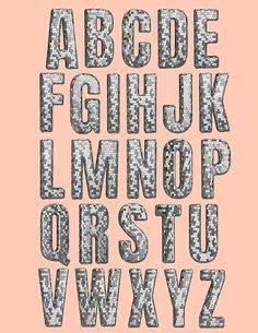 the alphabet is made up of silver glitters and letters are arranged in different sizes