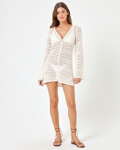 Play a little peek-a-boo in the Lisola Cover-Up. This crochet mini dress will be the star of your vacation with its v-neck, fixed strap + see-through knit fabric. Mini Cover Up Dress V Neck Button Down Bell Sleeves Crochet Size XS-XL 100% Cotton Like all delicates, shape, color and fit are best preserved if hand washed in cold water. Lay flat to dry. Style # SOFCV24 Model Measurements: Maitlynn, size S - Height 5'9, Bust 34", Waist 24", Hips 35" Bell Sleeves Crochet, Indah Clothing, Fawn Design, Crochet Size, Sparkle Shoes, Crochet Mini Dress, Jumpsuit Jacket, Eco Chic, Taurus And Gemini