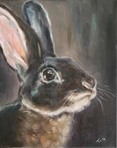 a painting of a black and white rabbit on a gray background, with the head turned to the right