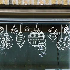 a window with ornaments drawn on it