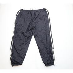 Vtg 90s Streetwear Mens XL Reversible Striped Cuffed Joggers Pants Black Gray Mens Pants Reversible. Black side: Blemishes front left leg. Gray side: Crotch area discolored. Has pilling. Color faded Mens size XLarge Measurements are: 20 inches across the waist laid flat 32 inch inseam 43 inches from top to bottom Multicolor Nylon Blend US Shipping is FREE Canada is $15 and International is $24 Check out my other items in my store! PR2242 90s Pants, Cuffed Joggers, Joggers Pants, Streetwear Mens, 90s Streetwear, Black Side, Pants Black, Striped Pants, Mens Trousers