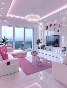 a living room filled with white furniture and pink accents