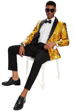 Fabric Material: 80% Polyester 20% Viscose Design One Button & Shawl Collar Package 1*Blazer Occasion Homecoming / Dinner / Red Carpet / Theme Party / Stage Performance / Prom / Dating The gold prom suit with a unique mirrored geometric patchwork pattern is the best choice for people who want to shine on prom night. This suit was made with great care and attention to detail. It combines modern style with artistic flair in a way that will make you the center of attention.The golden fabric gives o Gold Prom Suit, Red Carpet Theme Party, Homecoming Dinner, Gold Tuxedo, Red Carpet Theme, Golden Fabric, Party Outfit Men, Button Shawl, Prom Suit