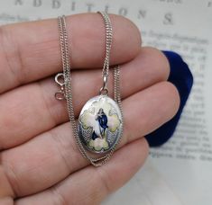 A genuine vintage Blessed Virgin Mary medal, antique enamel Catholic charm, petite religious catholic holy charm with inscription in German, very nicely done, in good vintage condition, ideal for necklace, would make a nice gift for someone special! Floats from a 16 inch long vintage 925 silver chain! Material: solid silver, porcelain Weight: 3.4g Measures: approx. 25 x 17 mm (1 x 0.6 inch) PLEASE LOOK AT THE PICTURES, THEY ARE PART OF THE DESCRIPTION AND ARE THE ACTUAL ITEM YOU WILL RECEIVE. AL Vintage Enamel Jewelry With Vintage Charm, Vintage Enamel Jewelry For Collectors, Vintage Enamel Collectible Jewelry, Victorian Enamel Medallion Necklaces, Enamel Medallion Necklace With Hallmark, Antique Enamel Locket Necklace, Vintage Locket Necklace With Charms As Collectible, Vintage Locket Necklace With Charms For Collectors, Antique Enamel Necklace With Hallmark