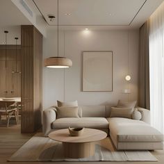 This cozy Scandinavian-inspired condominium living room features a light beige sectional sofa and a round wooden coffee table. Minimalist decor includes a pendant light and abstract wall art, creating a serene, inviting atmosphere. Soft natural light filters through sheer curtains, highlighting the warm neutral palette. The open layout seamlessly connects to the dining area, enhancing the airy, harmonious design. Minimalist Modern House Interior, Japandi Scandinavian Living Room, Natural Interior Design Living Room, Small Living Room Japandi, Beige Living Room Inspiration, Warm Natural Living Room, Living Room With Dining Area Apartment, Cozy Neutral Living Room Decor, Cozy Beige Living Room