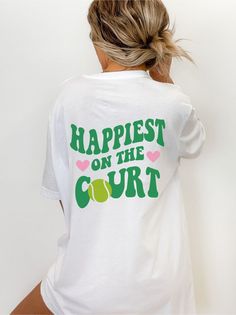 Looking for the most unique tennis gifts? Our trendy tennis shirts are perfect to sport on & off the court and make for fun gifts for tennis lovers alike. These super comfortable tennis tshirts will have you looking and feeling your very best. SIZING: These are unisex shirts and run slightly larger/longer for women. Please review the size guide in listing photos for specific sizing information. To achieve the oversized look pictured, size up 1-2 depending on the look you're going for; again, ple Green Short Sleeve Tennis Top, White Graphic Tennis T-shirt, White T-shirt For Spring Sports Events, Tennis Women, White Graphic Tee For Tennis, Spring Tennis Tops With Graphic Print, Green Graphic Print Tennis Tops, Green Casual Tennis T-shirt, Green Cotton T-shirt For Tennis