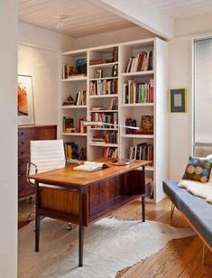 a living room filled with furniture and bookshelves