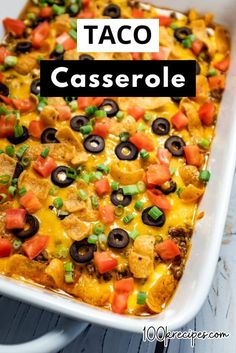 taco casserole in a white dish with the title above it