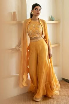 Shop for Mani Bhatia Yellow Silk Organza Embroidered Cape And Gharara Set for Women Online at Aza Fashions Yellow Sharara Set, Open Crop Top, Yellow Sharara, Sharara Designs, Cape Set, Haldi Outfits, Haldi Outfit, Mehendi Outfits, Trendy Outfits Indian