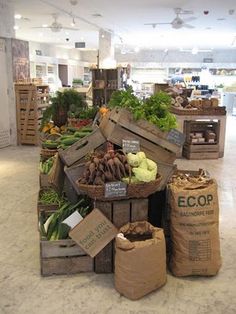 the produce section of a grocery store is full of fresh vegetables and other items for sale