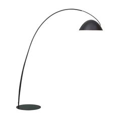 a black floor lamp with an oval base and a round light fixture on the side