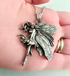 ★ Fairy Pendant ★ A beautiful handcrafted Fairy Pendant for Men and Women. * Materials/Finishes ➤ Artificially Aged (Black/Grey Oxidized) Silver 925 * Dimensions ➤ 5.1 x 4.2 x 0.7 cm (~ 2.0 x 1.6 x 0.3 inches)/Suitable for up to 3.0 mm (~ 0.1 inches) Chain * Weight: ~ 17 grams ----------------------------------------------------------------------------- IMPORTANT NOTES: ----------------------------------------------------------------------------- ➤ When buying from Gold and Silver Designs you wi Silver Fairy, Wanderlust Jewelry, Fairy Pendant, Pentagram Pendant, Wolves Pendants, Mountain Necklace, Wolf Jewelry, Pendant For Men, Fairy Necklace