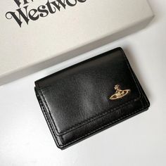 Vivienne Westwood Trifold Wallet 3318M1J Black NEW WATER ORB Description Guaranteed 100 % Authentic Product ! Condition: New Brand Vivienne Westwood color black style vintage Features tri-fold                                                                                       Visit our store: pinzou-japan Store ※ The color might be slightly different from the actual product due to the effect of light and monitor setting ※ Delivery to overseas may be delayed due to disasters, bad weather, etc., Vivien Westwood Wallet, Vintage Black Trifold Wallet For Everyday Use, Vintage Black Rectangular Trifold Wallet, Compact Black Trifold Wallet, Cool Wallets, Vivienne Westwood Purse, Wallet Aesthetic, Vivienne Westwood Wallet, Wood Wallet