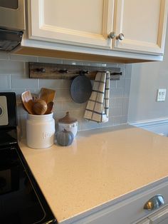 the kitchen counter is clean and ready to be used as a cooktop area for cooking