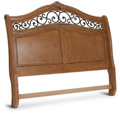 a wooden headboard with metal detailing on the top and bottom panel, against a white background