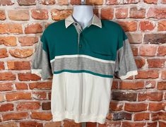 "vintage 80s banded polo shirt with amazing stripes and textures. Lightly used straight out of grandpa's closet no major issues to note MEASURES -  22.5\" pit to pit and 26\" long TAGGED - fits L My policy is NO RETURNS. If I made an error I will make it right 100% but I am not responsible if you change your mind/\"item does not fit\". PLEASE use the measurements provided if you don't know how ask me I will gladly help you :) - This is a TRUE VINTAGE item! Vintage clothing sizing varies wildly ALWAYS use the measurements and info provided in the listing to assure proper fit! The item is decades/years old and will have signs of wear/age/etc so please read the description! ** Why buy from VINTAGE ASSAULT? Because I have sold THOUSANDS of items to THOUSANDS of satisfied customers and have a t Vintage Green Collared T-shirt, Retro Polo Shirt With Relaxed Fit, Retro Relaxed Fit Polo Shirt With Polo Collar, Retro Relaxed Fit Polo Shirt, Vintage Polo Collar Top With Relaxed Fit, Steve Core, Emo Grunge, Striped Polo Shirt, Clothing Styles