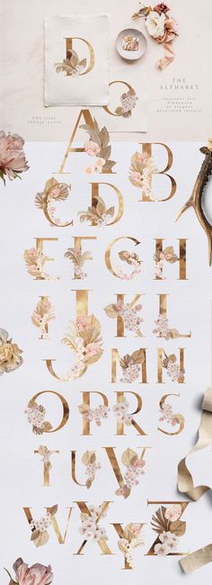 the letters and numbers are made out of gold foil with pink flowers on them, as well as paper tape