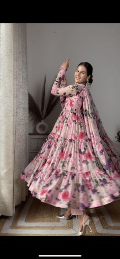 PRODUCT DESCRIPTION :-Presenting Dusty floral Printed chiffon tiered pattern Anarkali with matching Chiffon dupatta and cotton Pants . The Soft shade and Rose flower print is such a breathtaking combination . Anarkali :- Chiffon Pant :- CottonDupatta :- ChiffonClosure Used:- Side zipColor:- BeigeCare Instructions :- Dry clean onlyModel Size :- Model is wearing XS sizeModel Height :- 5.6''DISCLAIMER :- Slight color variations may occur due to different screen resolution. Floral Print Semi-stitched Floor-length Sharara, Semi-stitched Floral Print Floor-length Sharara, Floral Print Georgette Maxi Lehenga, Floral Print Georgette Lehenga Maxi Length, Floral Print Floor-length Semi-stitched Anarkali Set, Eid Anarkali Set With Ruffles, Multicolor Floral Print Georgette Sharara, Floral Print Floor-length Anarkali Set For Navratri, Anarkali Style Floor-length Floral Sharara