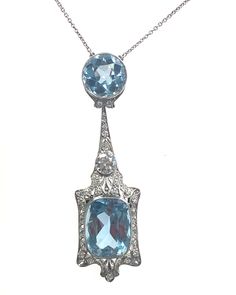 Introducing our exquisite Vintage Aquarium necklace, a true masterpiece of elegance and sophistication. This antique-inspired piece features a stunning combination of 2 Aqua stones totaling 12.70 carats and 6 carats, all encased in lustrous platinum. Vintage Aquarium, Aqua Stone, Antique Inspiration, Pendant Necklaces, Favorite Jewelry, Jewelry Necklace Pendant, Platinum, Jewelry Necklaces, Accessory Gift