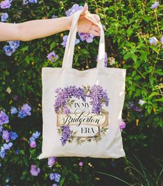 In my Bridgerton era. .: 100% cotton canvas .: 15" x 16" .: 20" handles .: Heavy fabric (12 oz/yd² (406.9 g/m .: Sewn-in label Wisteria Flower, Lady Whistledown, Regency Era, Flower Border, Wisteria, Canvas Tote Bag, Sew-in Labels, Heavy Fabric, Canvas Tote