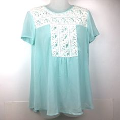 Sweet And Feminine Sheer Aqua Blouse Flowy Tunic Style, Has Nice Lace Embellishments Size S. Excellent Condition Nwt Summer Lace Patchwork Short Sleeve Blouse, Summer Short Sleeve Blouse With Lace Patchwork, Spring Lace Patchwork Tops For Day Out, Summer Blouse With Lace Patchwork And Short Sleeves, Casual Summer Blouse With Lace Patchwork, Spring Vacation Tops With Lace Patchwork, Summer Lace Patchwork Tops For Daywear, Casual Beach Blouse With Lace Patchwork, Casual Lace Patchwork Blouse For Beach