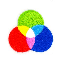 three different colored circles on a white background