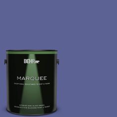 the behr marquee paint is shown in an open pink color with a green tint