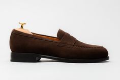 The Penny Loafer - Brown Suede | Morjas Classic Suede Leather Shoes For Galas, Wingtip Loafers With Suede Lining For Galas, Goodyear Welted Suede Oxfords For Galas, Goodyear Welted Suede Loafers For Work, Suede Goodyear Welted Loafers For Work, Luxury Tassel Loafers With Suede Lining For Business, Classic Formal Suede Monk Strap Shoes, Classic Wingtip Suede Monk Strap Shoes, Classic Suede Wingtip Monk Strap Shoes