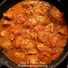 meat and pepper stew in a skillet on the stove top, ready to be eaten