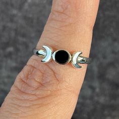 Brand New Sterling Silver Black Agate Moon Phase Ring Multiple Sizes Available Size 6, 8, 10 So Cute !!!! Silver Oval Moon Phase Ring, Symbolic Black Crescent Jewelry, Silver Moon Phase Crystal Ring, Black Symbolic Jewelry With Moon Charm, Silver Mystical Moon Phase Ring, Magical Sterling Silver Moon Phase Ring, Magical Moon-shaped Ring With Moon Phase, Moon Phase Ring, Cuff Ring