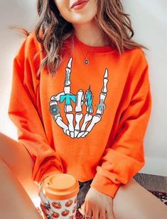 Unisex fit crew neck sweatshirt 50% cotton 50% polyester ••Holiday & seasonal items are FINAL SALE•• Orange Ribbed Cuffs Sweatshirt For Fall, Orange Long Sleeve Sweatshirt For Winter, Orange Crew Neck Sweater With Ribbed Cuffs, Orange Crew Neck Sweatshirt For Streetwear, Orange Letter Print Crew Neck Hoodie, Orange Ribbed Cuff Crew Neck Sweater, Graphic Print Orange Sweatshirt For Streetwear, Orange Winter Sweatshirt With Ribbed Cuffs, Orange Crew Neck Hoodie For Fall