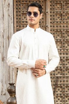 White kurta with silk thread embroidery in floral, aari pattern. Paired with a pant. - Aza Fashions White Embroidered Cotton Silk Bandhgala, Embroidered White Cotton Silk Bandhgala, White Cotton Silk Bandhgala With Resham Embroidery, Traditional Cotton Bandhgala With Floral Embroidery, White Cotton Silk Sherwani With Dabka, Wedding Cotton Sherwani With Floral Embroidery, Traditional White Cotton Silk Bandhgala, White Chanderi Sherwani With Floral Embroidery, Traditional Fit Kurta With Intricate Embroidery For Eid