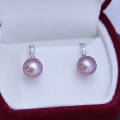 Freshwater pearls shimmer with very light overtones and classic purple body color seamlessly forming a single row of style distinction--an elegant look that only pearls can truly offer, setting them apart from any other gemstone or fine jewelry design. Materials: AAAA Freshwater Pearls, Size9-10mm, 925 sterling silver A FREE luxury jewelry box is included for high-quality pearl items. Product Information Pearl Type Freshwater Origin China Shape Round Quality AAAA Size 9-10 mm Nacre Very Thick Co Elegant Purple Pearl Earrings, Elegant Purple Pearl Earrings For Anniversary, Elegant Purple Pearl Earrings For Formal Occasions, Purple Pearl Formal Jewelry, Formal Purple Pearl Jewelry, Purple Pearl Jewelry For Formal Occasions, Elegant Lavender Round Bead Jewelry, Elegant Lavender Round Beaded Jewelry, Elegant Lavender Jewelry With Round Beads