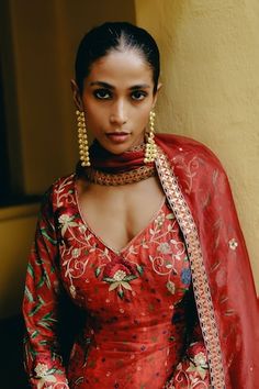 Red kurta featuring kalamkari print all over with aari, sequin, resham, zardosi hand embroidery on the neckline and sleeves. Paired with a kalamkari printed sharara and a sheer dupatta. - Aza Fashions Festive Meenakari Palazzo Set With Traditional Drape, Designer Red Anarkali Set With Motifs, Red Anarkali Set With Motifs, Festive Red Anarkali Set With Meenakari Detail, Festive Red Meenakari Anarkali Set, Designer Red Anarkali Set With Meenakari, Designer Red Meenakari Anarkali Set, Red Meenakari Anarkali Set For Designer Wear, Red Meenakari Dupatta For Designer Wear