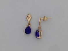 "SOLID 14KT YELLOW GOLD DANGLE EARRINGS NATURAL SAPPHIRE IS 5x7 mm PEAR SHAPE EACH  SAPPHIRE IS CABOCHON CUT NATURAL DIAMOND IS 0.02 TCW EARRING LENGTH IS 5/8\" INCH COMES IN GIFT BOX" How To Wear Earrings, Gold Dangle Earrings, Diamond Dangle Earrings, Dope Jewelry, Classy Jewelry, Funky Jewelry, Jewelry Lookbook, Sapphire Earrings, Girly Jewelry