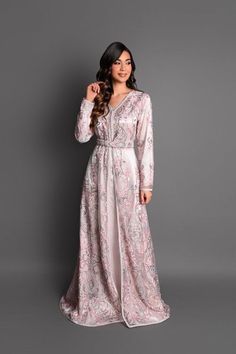 Two-piece creative kaftan, traditional cut, luxury lace Origin: Moroccan artisanal confection This caftan is designed in high quality fabrics - Lining (dfina) in silk satin - High-end beaded lace kaftan - Traditional kaftan cut - Long sleeves - Sfifa decoration in two colors: pink, gray - Aqâads decorated with two colors: pink, gray in simple pose. - The belt is made by our master craftsmen, with coordinated fabrics - The hooks and laces are made of silk threads for a neat finish. Adjustable bel Elegant Maxi Kaftan With Intricate Embroidery, Elegant Maxi Length Kaftan With Intricate Embroidery, Elegant Long Kaftan With Intricate Embroidery, Luxury Long Sleeve Kaftan For Wedding, Formal Kaftan With Intricate Embroidery For Eid, Formal Embroidered Kaftan For Eid, Formal Eid Kaftan With Intricate Embroidery, Elegant Embroidered Kaftan For Party, Elegant Maxi Length Eid Kaftan