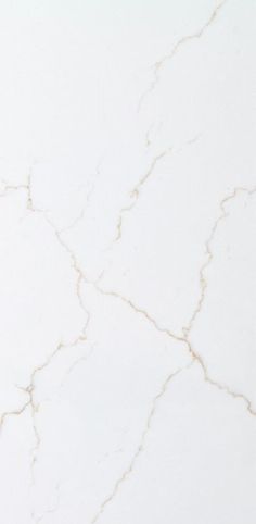 a white marble counter top with cracks in it