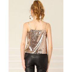 A classic cami that's elevated by modern embellished detailing. Sequins are the main feature of this sleeveless wardrobe. A simple vest is given a striking update with a sequin overlay, with a V-front for a flattering shape which is perfect to pair with the coordinating sequin skirt for a festive ensemble or on its own with trousers and heeled boots. Perfect for adding sparkles to this season, complete the look with leather leggings and a matching jacket. Except for gold, the tops of other color Glamorous Tank Top For Party Season, Glamorous Fitted Vest Top, Glamorous Fitted Tank Vest, Spring Sequined Spaghetti Strap Camisole, Sequin Spaghetti Strap Camisole For Spring, Spring Camisole With Sequins And Spaghetti Straps, Elegant Party Vest Top, Glamorous Sequined Spaghetti Strap Tops, Glamorous Sequined Spaghetti Strap Camisole