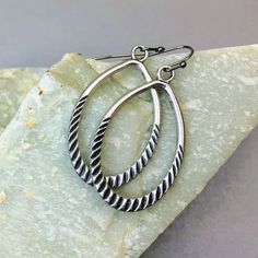 Beautifully detailed antique silver large hoop earrings. Great everyday earrings that can be worn with anything, day to evening. Lightweight and comfortable. Double sided design. Handmade jewelry, trending now.  Hypoallergenic ear wires (nickel and lead free). Select ear wire style at checkout. You may also like: https://www.etsy.com/listing/1380214360/silver-hoop-earrings-rustic-earrings A gift for you or someone special, earrings are carded and in an organza bag. More of my silver earrings: ht Silver Oxidized Teardrop Earrings, Silver Small Hoop Teardrop Earrings With Ear Wire, Teardrop Oxidized Hoop Earrings As Gift, Teardrop Oxidized Hoop Earrings For Gift, Everyday Oxidized Teardrop Earrings, Everyday Teardrop Earrings With Oxidized Finish, Vintage Teardrop Nickel-free Hoop Earrings, Vintage Nickel-free Teardrop Hoop Earrings, Silver Oval Nickel-free Teardrop Earrings