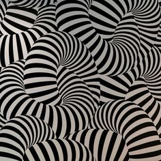 an abstract black and white wallpaper with wavy lines in the form of balls or stripes