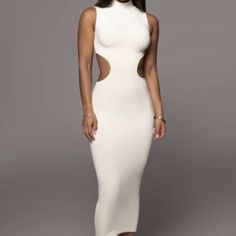 Brand New Forever Mesmerizing In Our Ivory Til Sunrise Midi Dress. This Beautiful Midi Dress Highlights A Mock Neckline With Sleeveless Shoulders And A Seductive Cutout At The Waist. Double Lined. Stretchy. Designed In Our New Gummi Fabric Delivering Premium Quality In A Creamy Soft Material Constructed With Sculpting Support And 4-Way Stretch Offering High Elasticity While Retaining Its Hold. Materials: 68% Polyester 26% Rayon 6% Spandex Length: (Full) 52 In. Product Origin: Imported Washing In White Sleeveless Bodycon Dress For Date Night, Chic Sleeveless White Bodycon Dress, Off White Sleeveless Evening Midi Dress, Off White Sleeveless Midi Dress For Evening, White Sleeveless Dress For Night Out, Fitted Sleeveless Cream Midi Dress, Cream Fitted Sleeveless Midi Dress, Chic Sleeveless Off-white Midi Dress, White Sleeveless Maxi Dress For Night Out