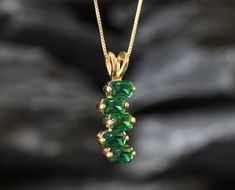 Gold Emerald Pendant set with created Emerald in a emerald cut, flawless clarity & green color, at 6x4 mm each, 3.5 Carats combined. Gold Asymmetrical Pendant design made of Gold Vermeil ☞ thickest 18k Gold Plating on top of Solid 925 Sterling Silver ☞ made to last. Free Gold Vermeil Chain with every Pendant order, 18 inch Silver chain (46 cm) ✓ Matching Ring: www.etsy.com/uk/listing/963614160 Matching Earrings: www.etsy.com/uk/listing/979478045 ⌛ Last Pendants left ⌛ ❀ Each Natural Gem is uniqu Green Emerald Baguette Cut Necklace, Elegant Green Baguette Cut Emerald Necklace, Elegant Green Baguette-cut Emerald Necklace, Emerald Baguette Cut Necklace As Gift, Baguette Cut Emerald Necklace As Gift, Baguette Cut Emerald Necklace For Gift, Green Baguette Cut Hallmarked Jewelry, Baguette Cut Emerald Necklace Gift, Green Emerald Cut Necklace With Prong Setting