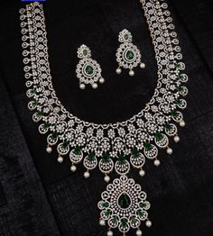 **Exquisite Diamond Replica Haram Necklace Set** Transform your look with our stunning Diamond Replica Haram Necklace Set, designed to bring unmatched elegance to your special occasions. This beautifully crafted jewelry set is perfect for brides and anyone looking to add a touch of luxury to their ensemble. **Product Details - **Materials High-quality diamond replicas that offer brilliance and durability. - **Design Intricate haram necklace with matching earrings, combining traditional craftsman Silver Diamond Necklace With Stone Work, Dazzling Diamond Cut Bridal Sets For Wedding, Elegant Bridal Sets With Crystal Stone Work, Elegant Wedding Necklace With Lab Grown Diamond, Elegant Lab Grown Diamond Wedding Necklace, Luxury Diamond Jewelry With Stone Work, Silver Diamond Necklace With Stone Work For Wedding, Gold Lab Grown Diamond Necklace For Wedding, Classic Bridal Necklace With Cubic Zirconia For Wedding