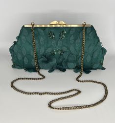 Your special occasion outfit will be complete with this elegant dark green clutch with 3-d floral beaded sequin lace.  When in doubt, request a free swatch.  Available with antique gold hardware.   Height is 5", top length is 8",  length at bottom is 11".  It expands to 2" at bottom.  Inside lining is dark green satin.    While there is a shipping cost, please know that we take the utmost care in packaging your clutch.  You will feel like you received a gift. We want you to happy with your purchase!  Our best advice is...be sure to read the product description and note the product dimensions for size so that you can make an educated purchase.  Have your color sample in hand if you are trying to match a color, and do not go by the name of the color to attempt a color match.  Keep in mind th Antique Gold Frame, Dark Green Wedding, Green Clutch, Green Clutches, Occasion Outfit, Wedding Clutch, Special Occasion Outfits, Green Satin, Color Samples